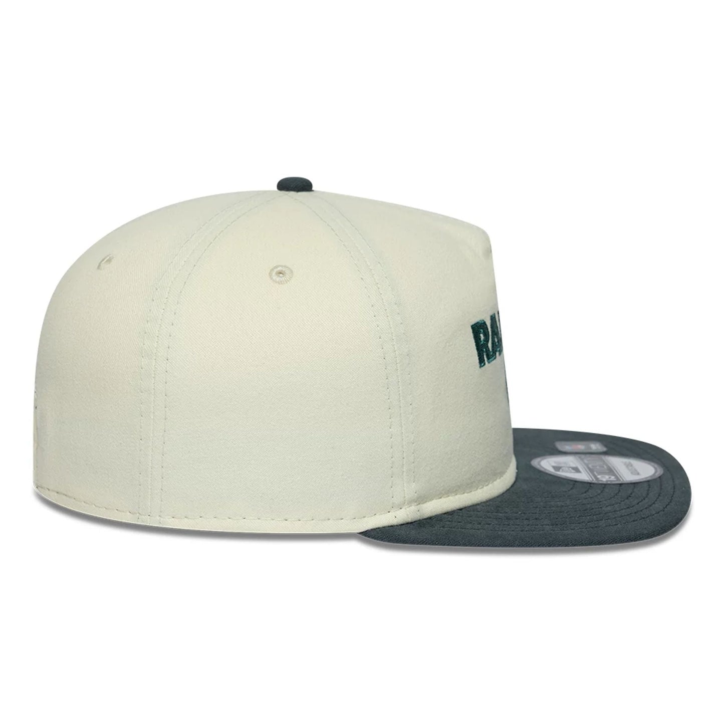 Las Vegas Raiders NFL Metallic Logo Cream New Era 19TWENTY Adjustable Cap, side view showing the dark green embroidered Raiders lettering on the cream curved crown, with a contrasting charcoal grey visor and a black top button.