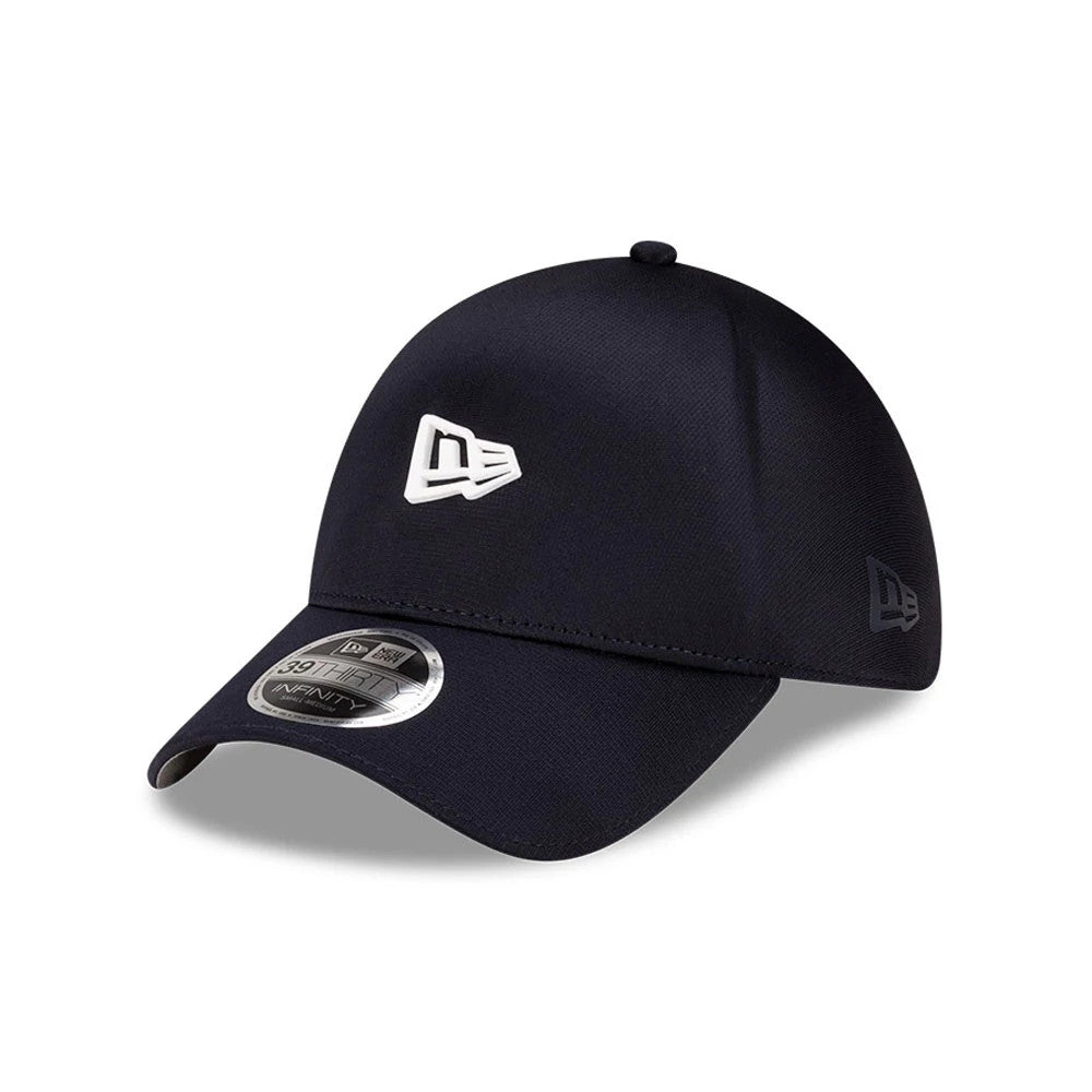 New Era Navy 39THIRTY Infinity Stretch Fit Cap, three-quarter view showing a raised white embroidered New Era logo on the front panel, a dark curved visor with 39THIRTY size sticker, and another embroidered logo on the left side.