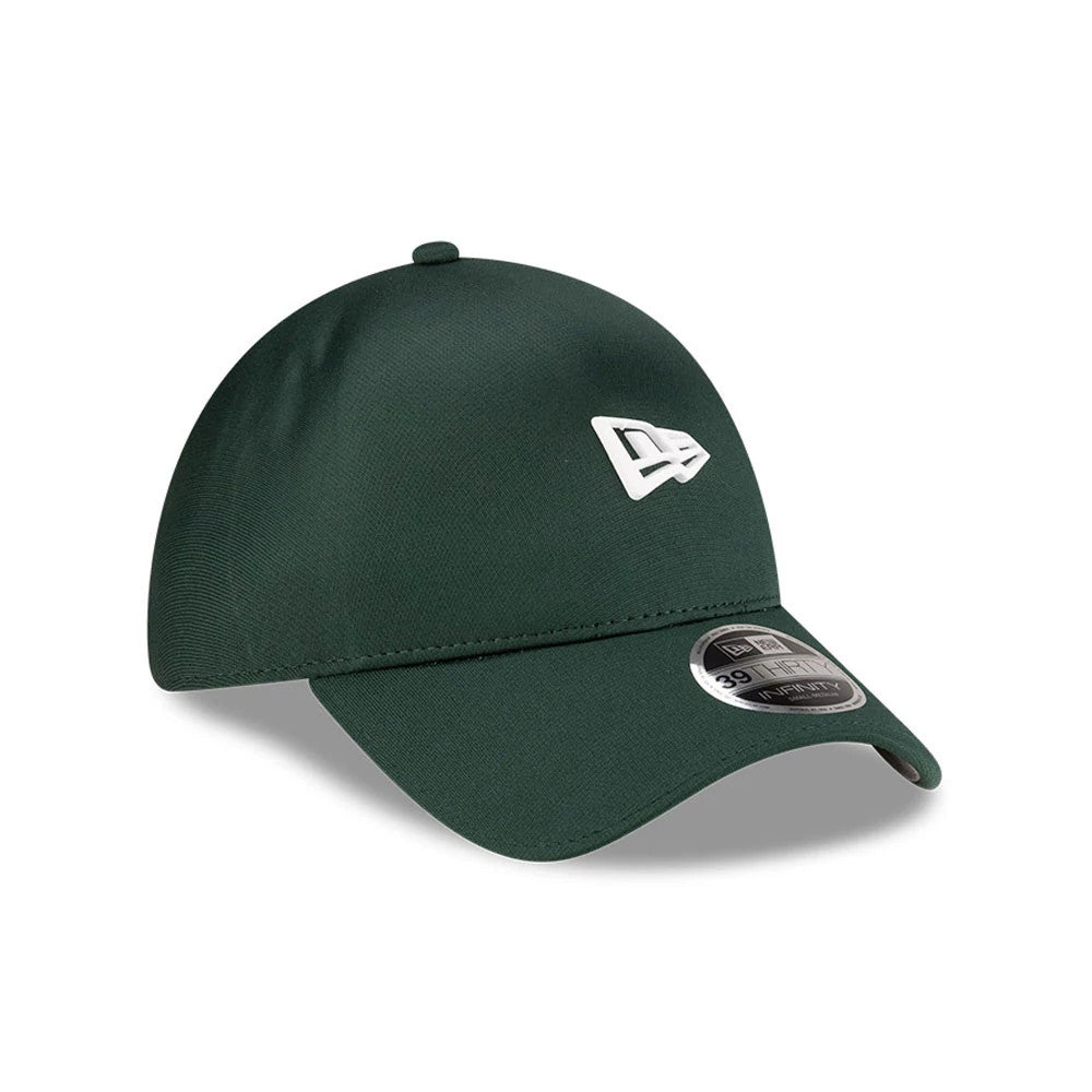 New Era Dark Green 39THIRTY Infinity Stretch Fit Cap, three-quarter view showing a white New Era flag logo embroidered on the left front panel, a curved dark green visor, and a black and silver 39THIRTY size sticker on the top of the visor.