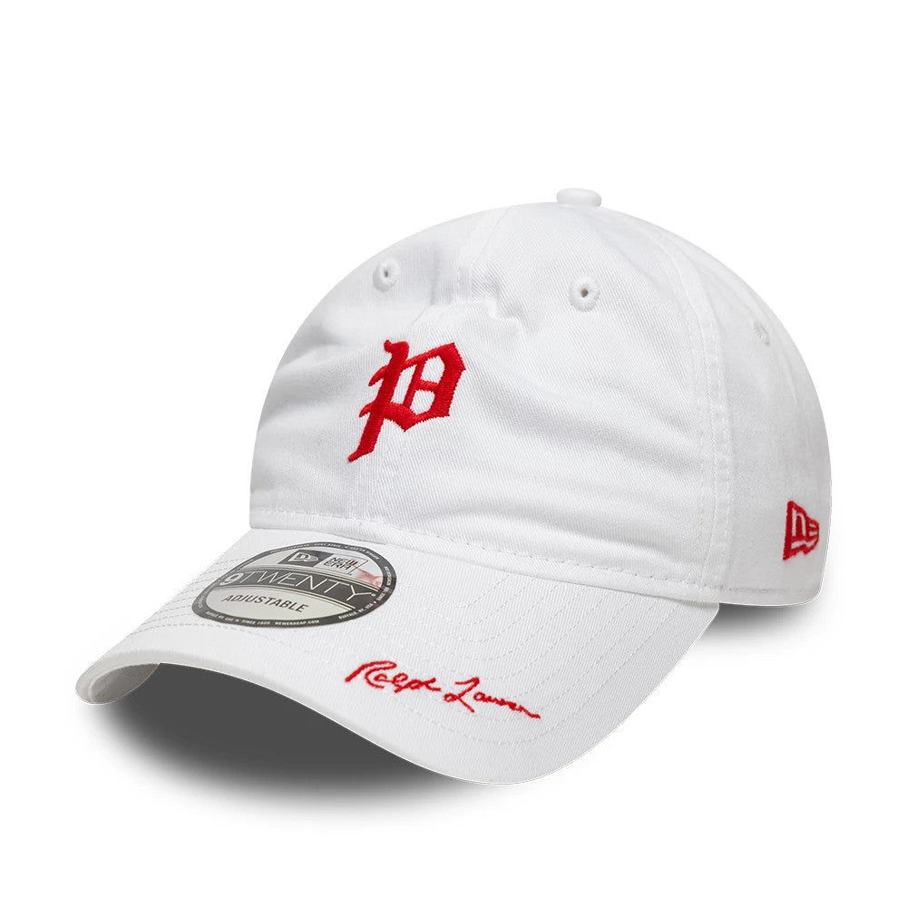 Philadelphia Phillies Ralph Lauren X MLB White New Era 9TWENTY Adjustable Cap, three-quarter view showing the red embroidered P logo on the front panel, curved white visor with Ralph Lauren signature in red, and New Era flag logo on the left side.