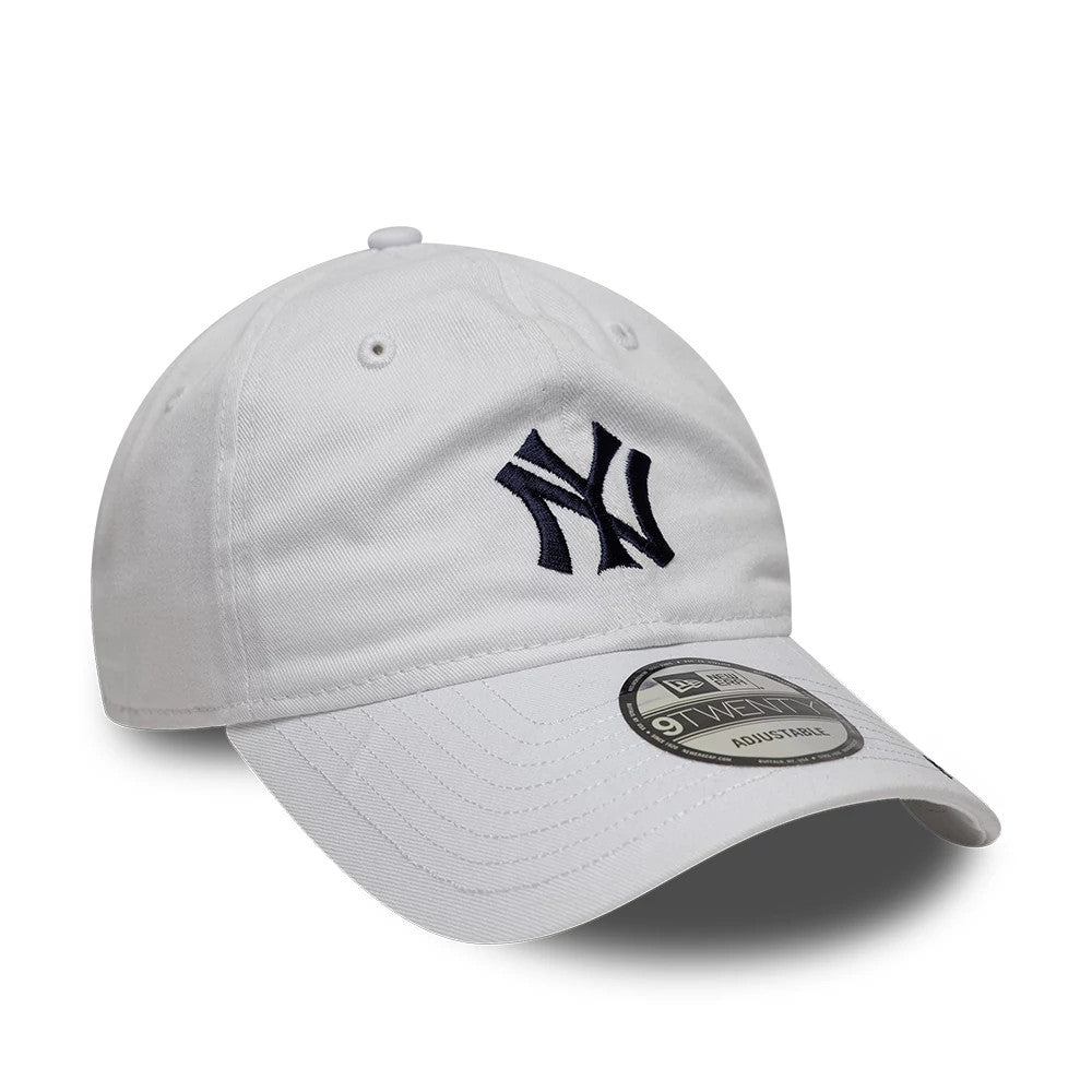 New York Yankees Ralph Lauren X MLB White New Era 9TWENTY Adjustable Cap, three-quarter view showing the navy embroidered NY logo on the unstructured white crown, with a curved white visor and a 9TWENTY size sticker on top.