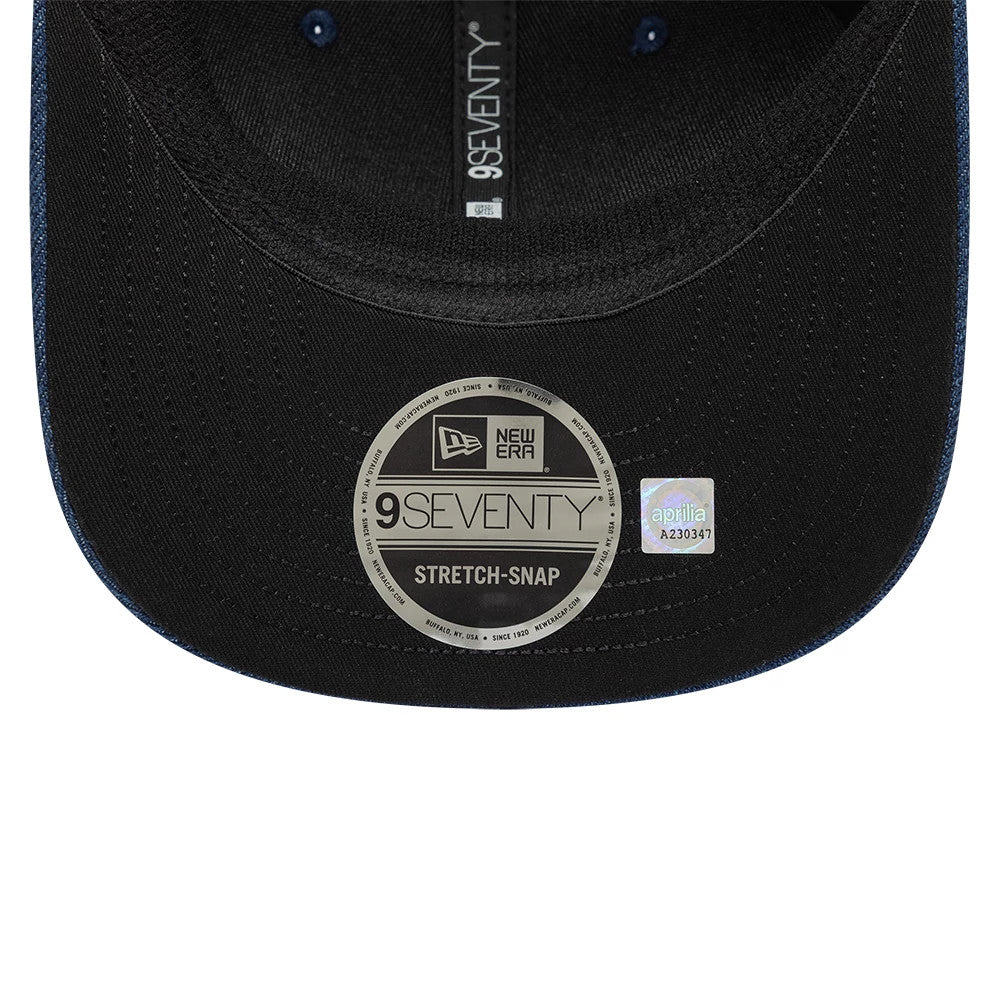 Aprilia Replica Jorge Martin Austin Race Special Blue New Era 9SEVENTY Stretch Snap Adjustable Cap, inside view showing the black undervisor with the 9SEVENTY size sticker in the centre, grey taping down the crown.