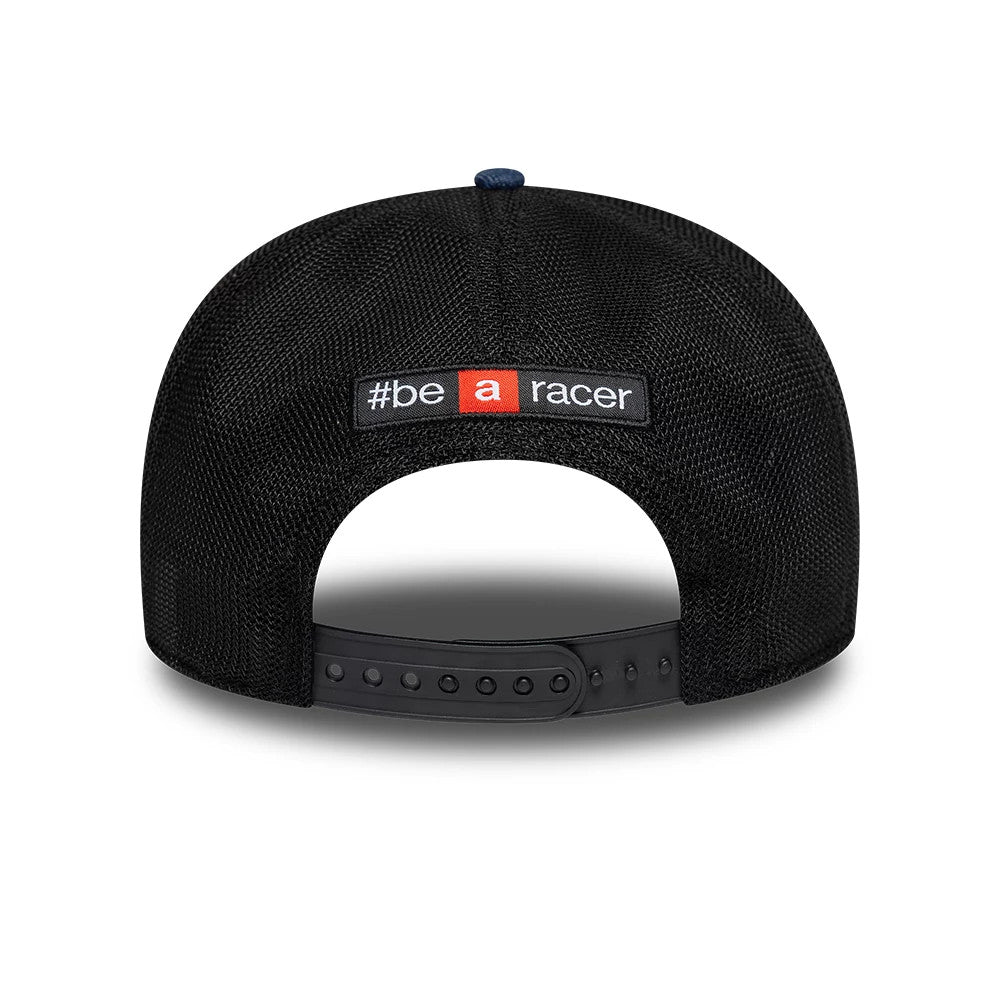 Aprilia Replica Marco Bezzecchi Austin Race Special Blue New Era 9SEVENTY Stretch Snap Adjustable Cap, rear view showing the #be a racer embroidered text in black, white and red on the back panels, with an adjustable black snap closure.