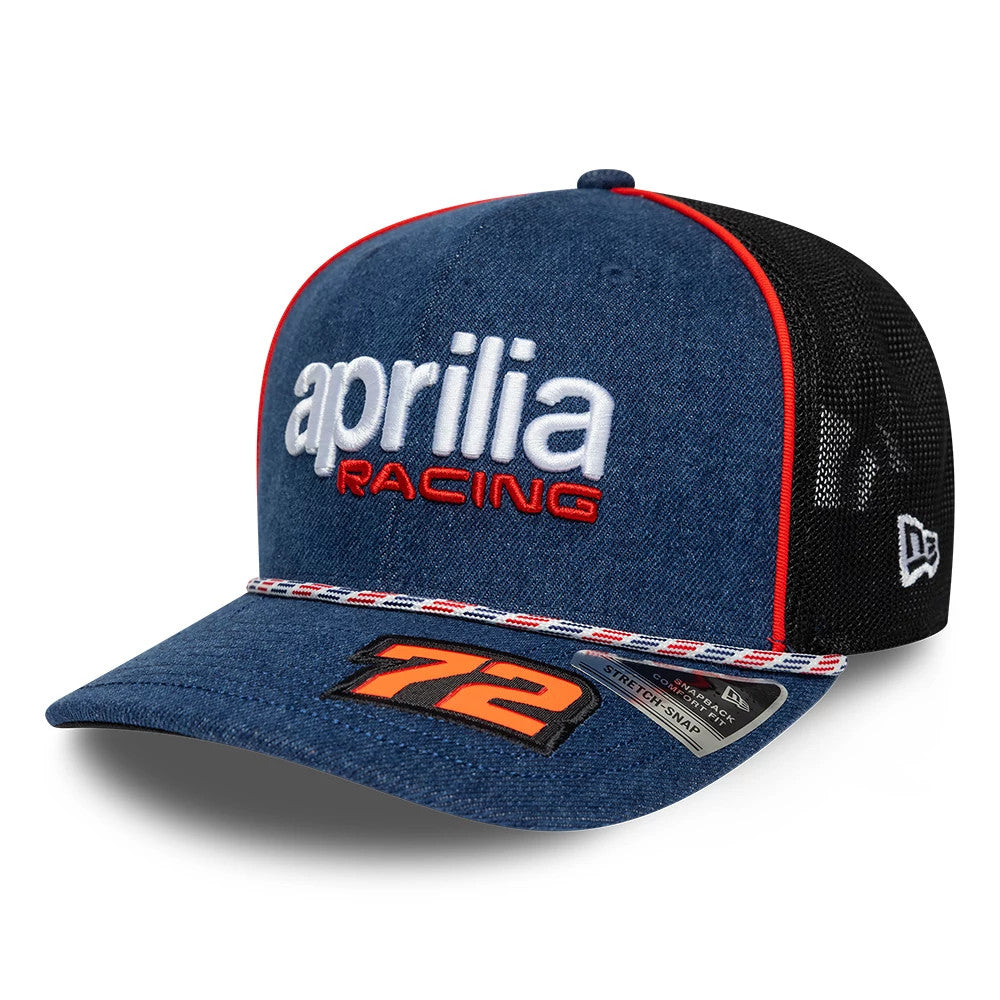 Aprilia Replica Marco Bezzecchi Austin Race Special Blue New Era 9SEVENTY Stretch Snap Adjustable Cap, front view showing raised white and red aprilia racing logo on the blue front panel, orange 72 embroidered on the visor, and black mesh back.