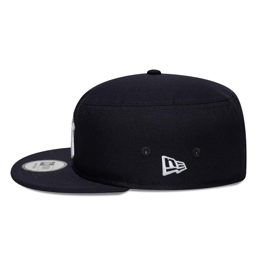 New Era New York Yankees MLB Poly Navy Pillbox Adjustable Cap, side view showing the white embroidered New Era flag logo on the left side of the navy crown, with matching navy visor and a 9FORTY size sticker on the top of the visor.