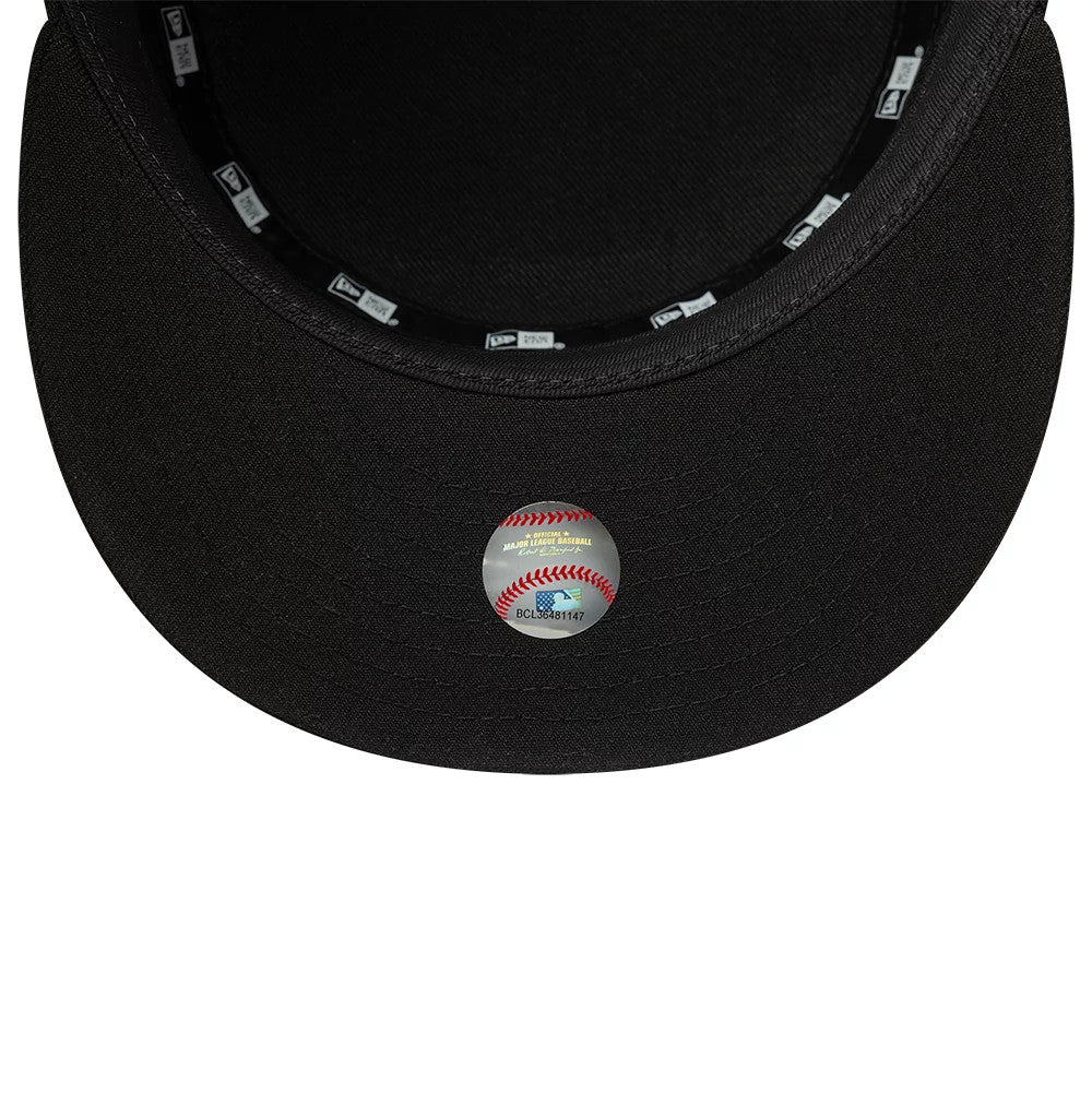 New Era Chicago White Sox MLB Poly Black Pillbox Adjustable Cap, inside view showing the black taping with repeated New Era logos, black sweatband, and a round silver sticker with a baseball graphic on the black undervisor.