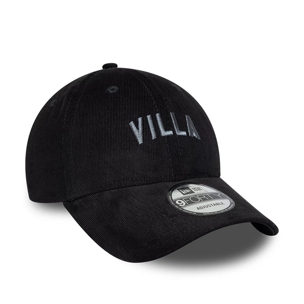 Aston Villa FC Cord Black New Era 9FORTY Adjustable Cap, three-quarter view showing the grey embroidered VILLA wordmark on the front panel, with a curved visor featuring a 9FORTY size sticker and a corduroy texture on the structured black crown.