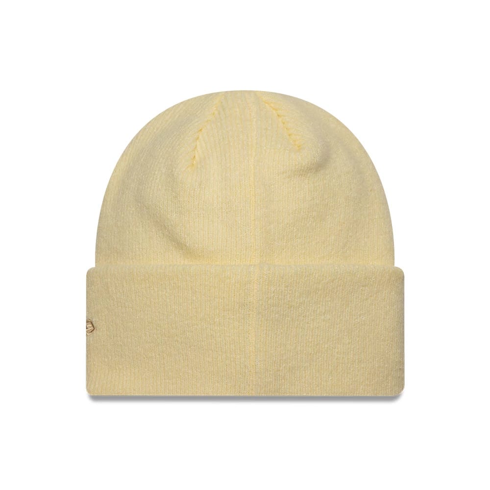 New Era Mohair Pastel Yellow Wide Cuff Knit Beanie Hat, front view showing a soft pastel yellow colour and wide cuff with a textured finish, featuring the New Era flag logo embroidered discreetly on the side of the cuff.