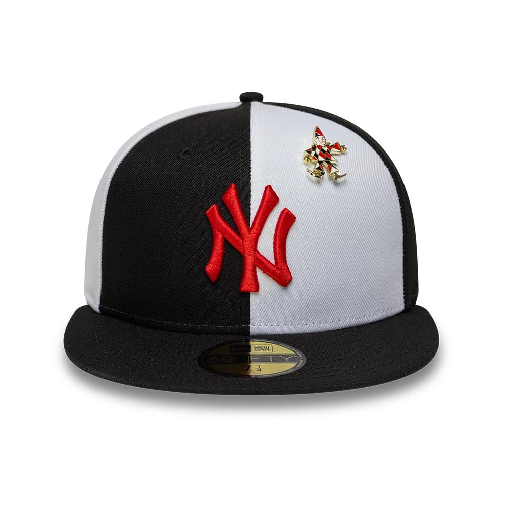New York Yankees MLB Pinwheel Black New Era 59FIFTY Fitted Cap, front view showing the raised red NY logo on the black and white panelled front, a decorative clown pin to the right, and a gold 59FIFTY size sticker on the black visor.
