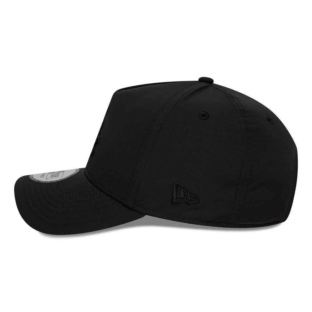 White Sox MLB Recycled Black On Black New Era 9FORTY A-Frame Adjustable Cap, side view showing the embroidered New Era flag logo on the left side, contrasting textured black visor with a 9FORTY size sticker, and structured crown design.