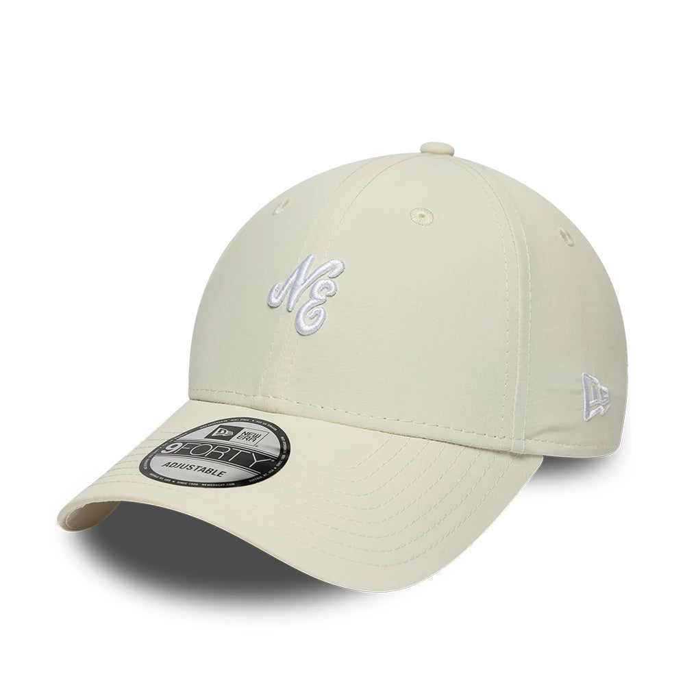 New Era Mini Logo Recycled Light Beige 9FORTY Adjustable Cap, front view showing the white NE logo embroidered on the front panel, a matching light beige curved visor with a 9FORTY size sticker, and the New Era flag logo on the left side.