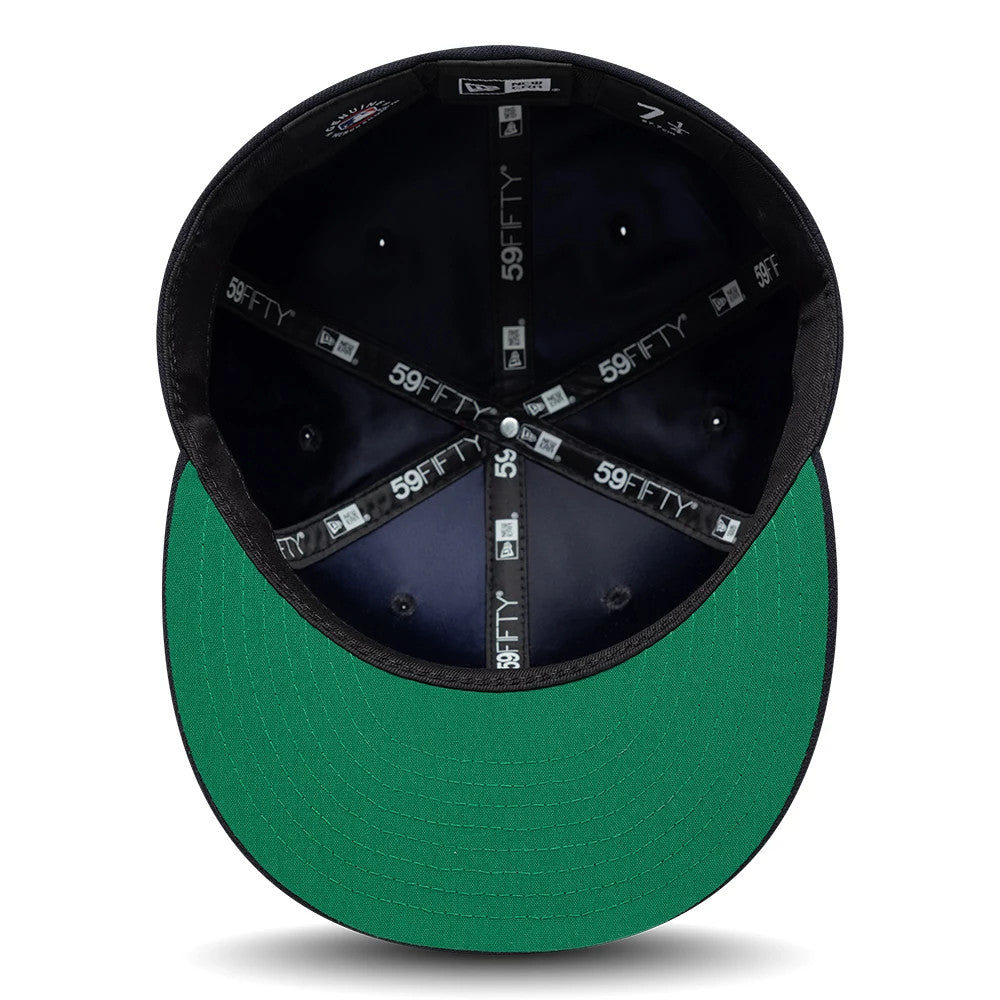 Detroit Tigers MLB Sidepatch Satin Lined Navy New Era 59FIFTY Fitted Cap, inside view showing the satin lining with black 59FIFTY taping along the seams, a green undervisor, and a black sweatband surrounding the interior.