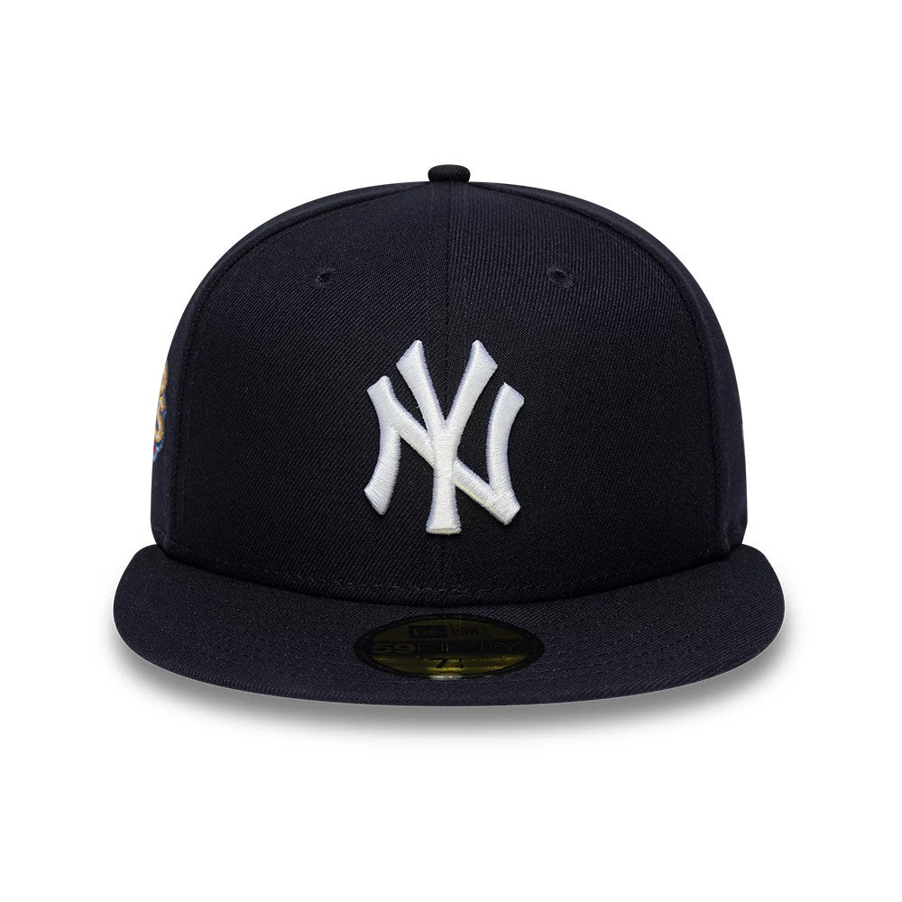 New York Yankees MLB Sidepatch Satin Lined Navy New Era 59FIFTY Fitted Cap, front view showing the raised white embroidered NY logo on the structured navy front panel, with a black flat visor and a gold 59FIFTY size sticker on the visor.