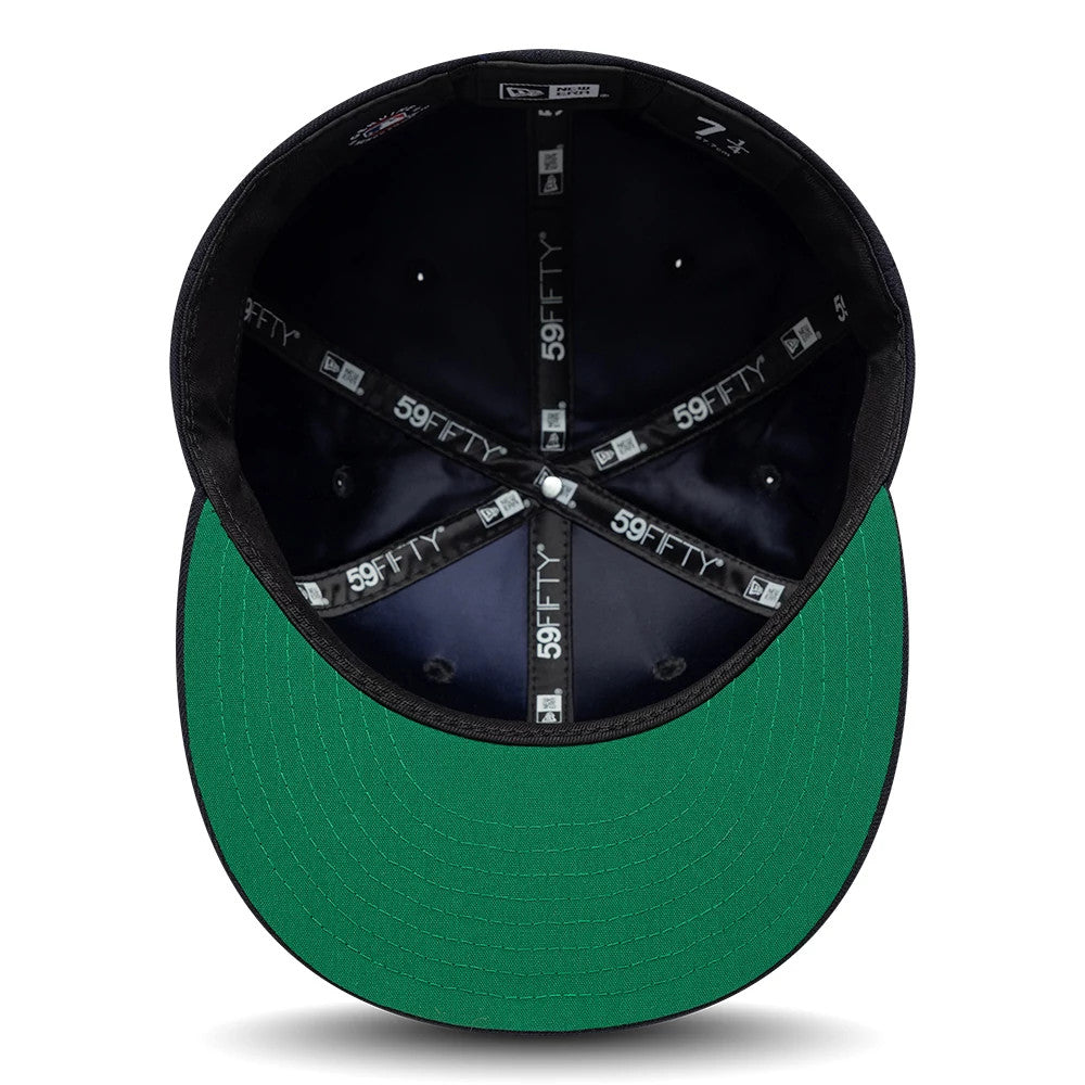 New York Yankees MLB Sidepatch Satin Lined Navy New Era 59FIFTY Fitted Cap, inside view showing the distinct green undervisor, black sweatband, and satin lining with multiple 59FIFTY logos on the black taping.