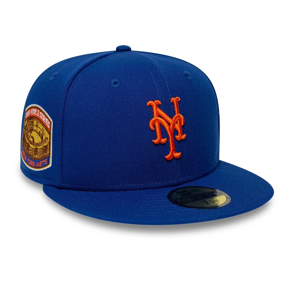 New York Mets MLB Sidepatch Satin Lined Blue New Era 59FIFTY Fitted Cap, three-quarter view showing the orange embroidered NY logo on the front panel, a sidepatch with World Series details, and a gold 59FIFTY size sticker on the flat blue visor.