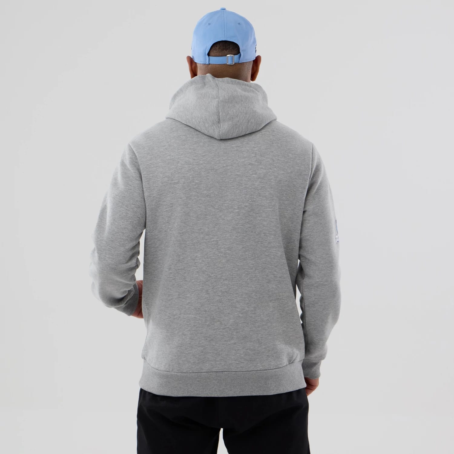 The model is wearing this NBA Berlin Game 2026 Memphis Grizzlies Pullover Hoodie in grey. 2