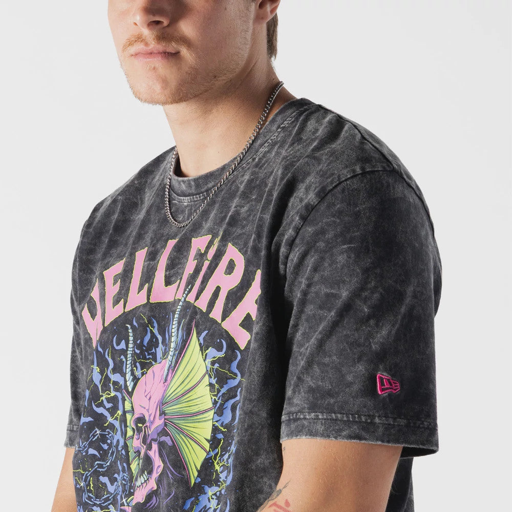 The model is wearing this Netflix Stranger Things Hell Fire Club T-Shirt in black. 3