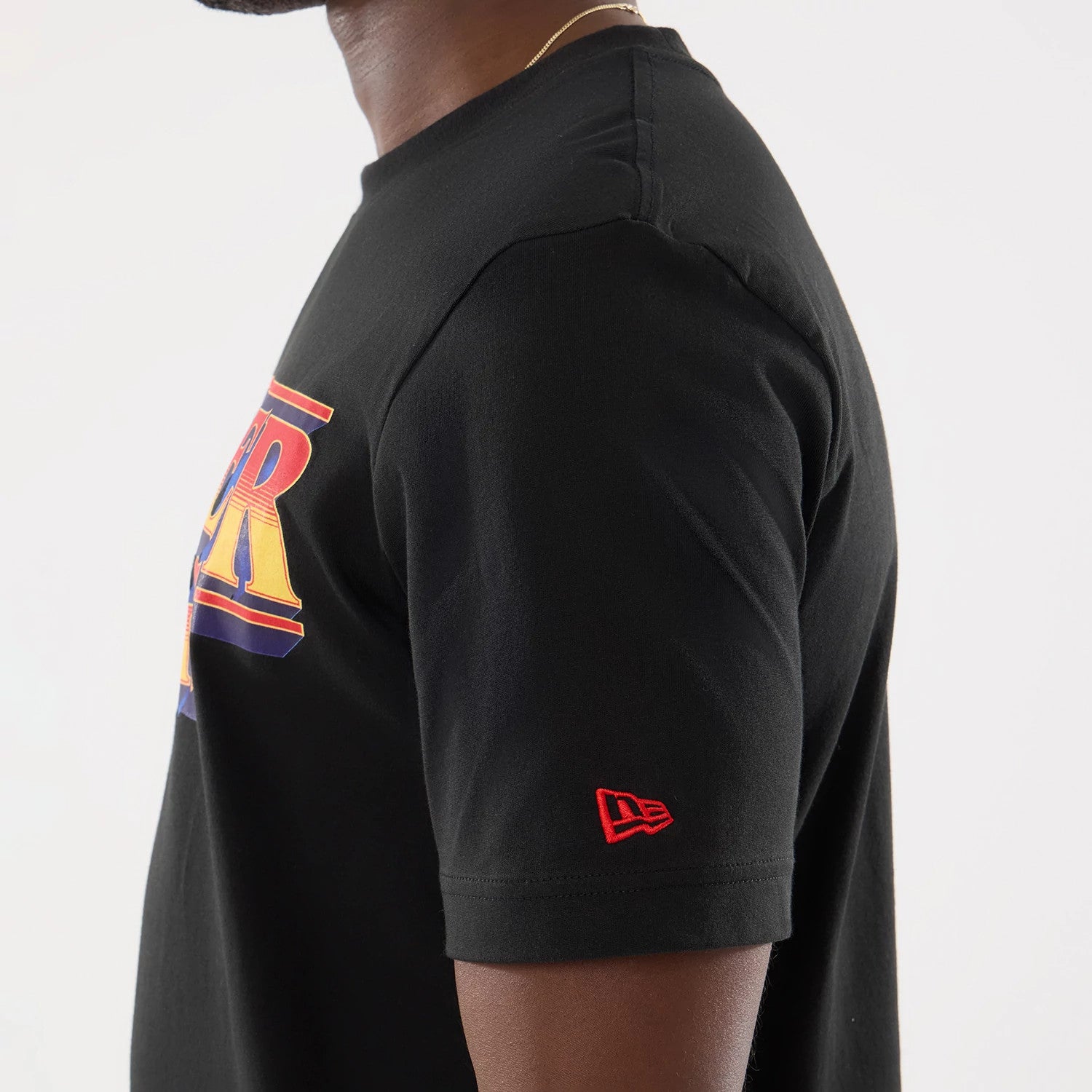 The model is wearing this Netflix Stranger Things T-Shirt in black. 4