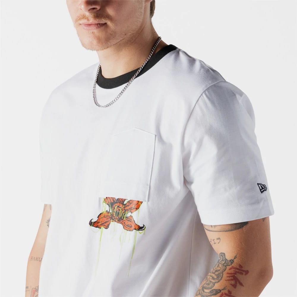 The model is wearing this Netflix Stranger Things Demogorgon T-Shirt in white. 3