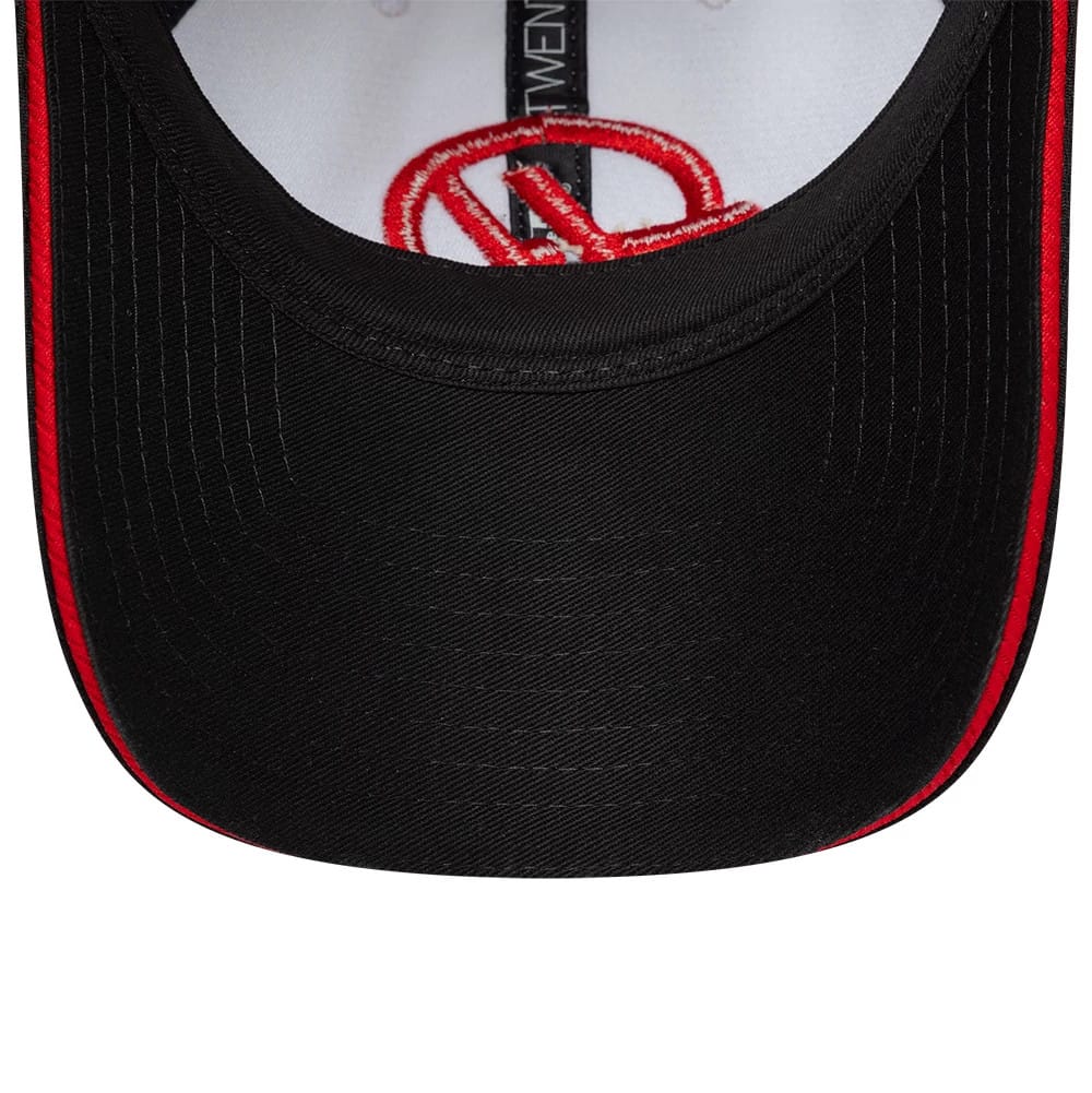 Pictured is this Womens TGR Haas F1 Open Back cap in black. 5