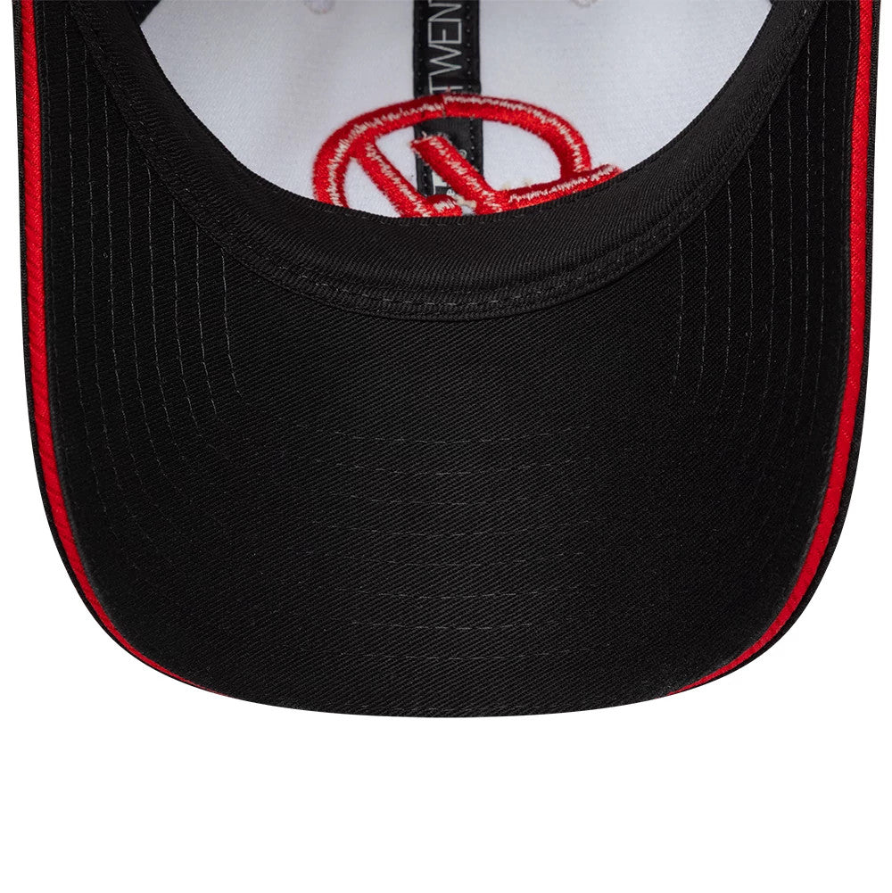 Pictured is this Womens TGR Haas F1 Open Back cap in black. 5