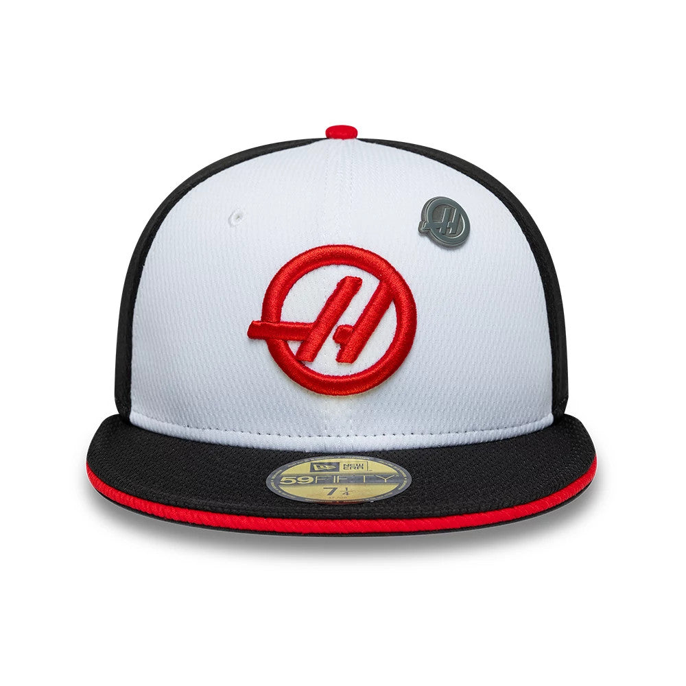 TGR Haas F1 Summer League Black New Era 59FIFTY Fitted Cap, front view showing the red and white embroidered logo on the white front panel, a black visor with red trim, and a gold 59FIFTY size sticker.