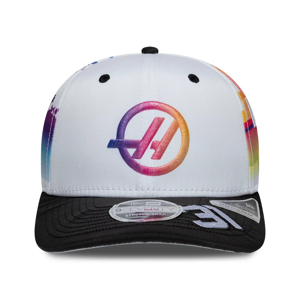 Pictured is this Esteban Ocon Miami Race Special TGR Haas F1 9SEVENTY Stretch Snap cap in white. 3
