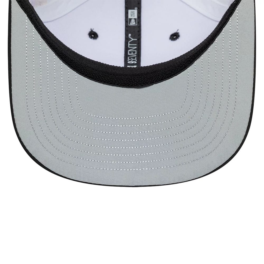 Pictured is this Esteban Ocon Miami Race Special TGR Haas F1 9SEVENTY Stretch Snap cap in white. 2