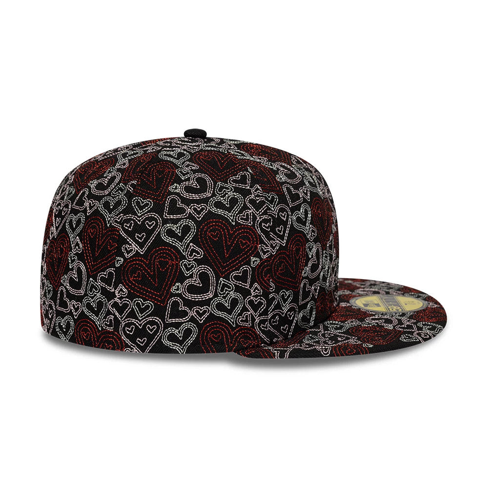 Pictured is this New Era All Over Hearts 59FIFTY Fitted cap in black. 7