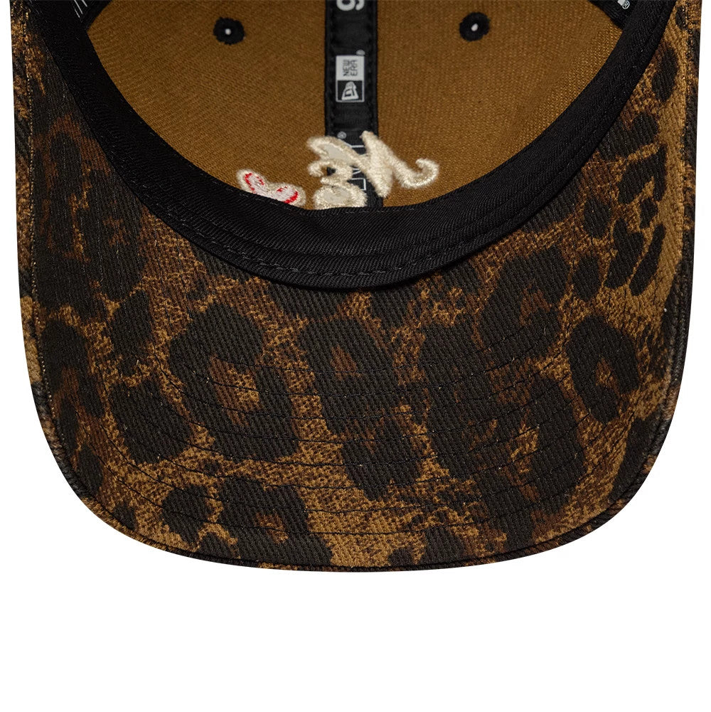 New Era Leopard Heart Brown 9TWENTY Adjustable Cap, inside view showing the brown leopard print visor and crown, with a black sweatband and taping, red heart detail, and beige decorative stitching accents under the curved visor.