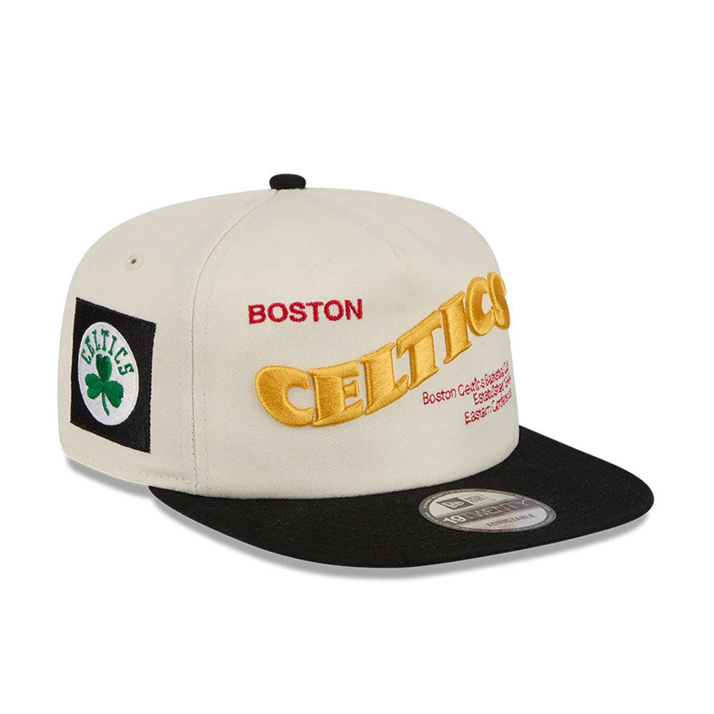Boston Celtics NBA Conference Script White New Era 19TWENTY Adjustable Cap, front view showing yellow raised embroidered Celtics lettering with red Boston above, black square patch with Celtics logo on the left side.
