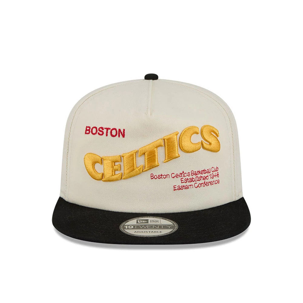 Boston Celtics NBA Conference Script White New Era 19TWENTY Adjustable Cap, front view showing the raised gold embroidered Celtics lettering across the front panels, black flat visor, and 19TWENTY size sticker on the visor.