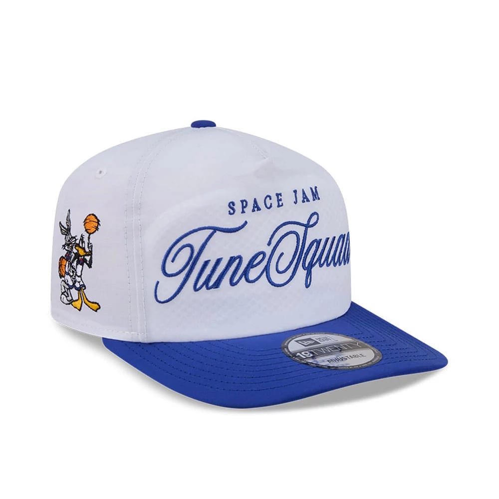 Space Jam Tune Squad White New Era 19TWENTY Adjustable Cap, three-quarter view showcasing the blue and white embroidered Tune Squad text on the front panel, Bugs Bunny graphic on the side, and a blue visor with a 19TWENTY size sticker.