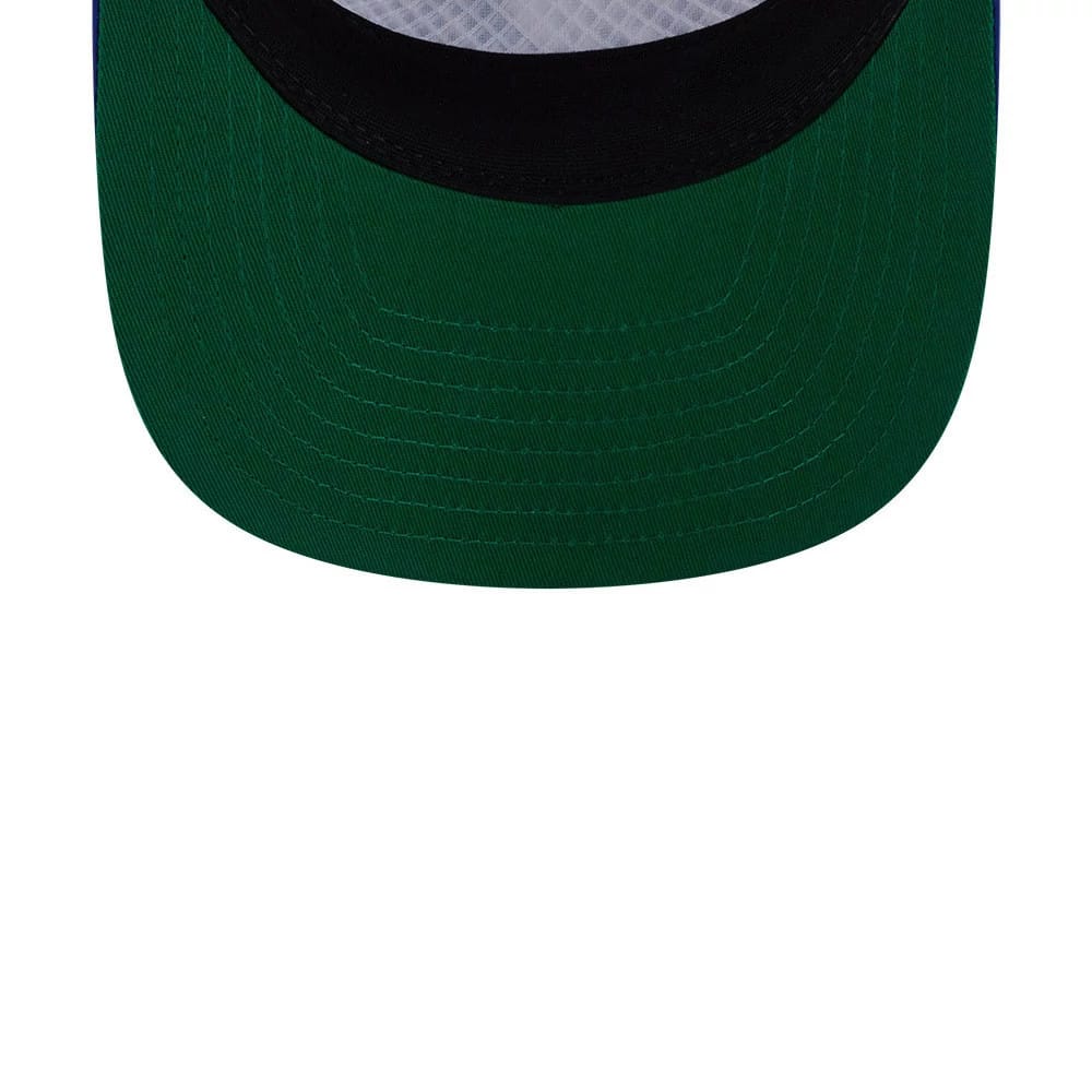 Space Jam Tune Squad White New Era 19TWENTY Adjustable Cap, inside view showing a contrasting green undervisor, black sweatband encircling the interior, and an eye-catching white diamond-patterned fabric on the crown.
