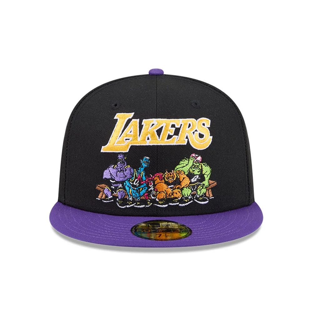 LA Lakers Space Jam Monstars Black New Era 59FIFTY Fitted Cap, front view showing a yellow and white embroidered Lakers logo above colourful Monstars characters, with a flat purple visor and a gold 59FIFTY size sticker on the visor.