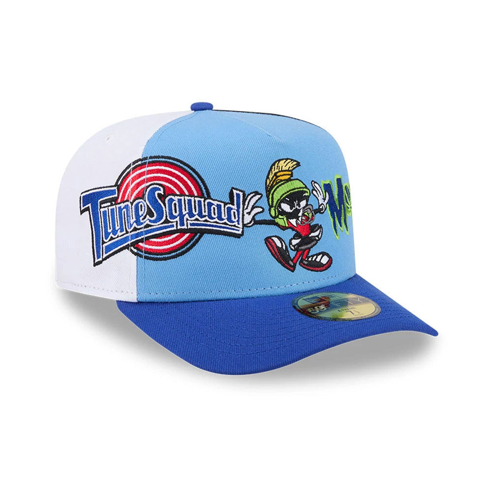 Space Jam Referee Blue New Era 59FIFTY A-Frame Fitted Cap, three-quarter view showing the embroidered Tune Squad logo and Marvin the Martian character on the light blue front panel, with a matching blue visor and a gold 59FIFTY size sticker.