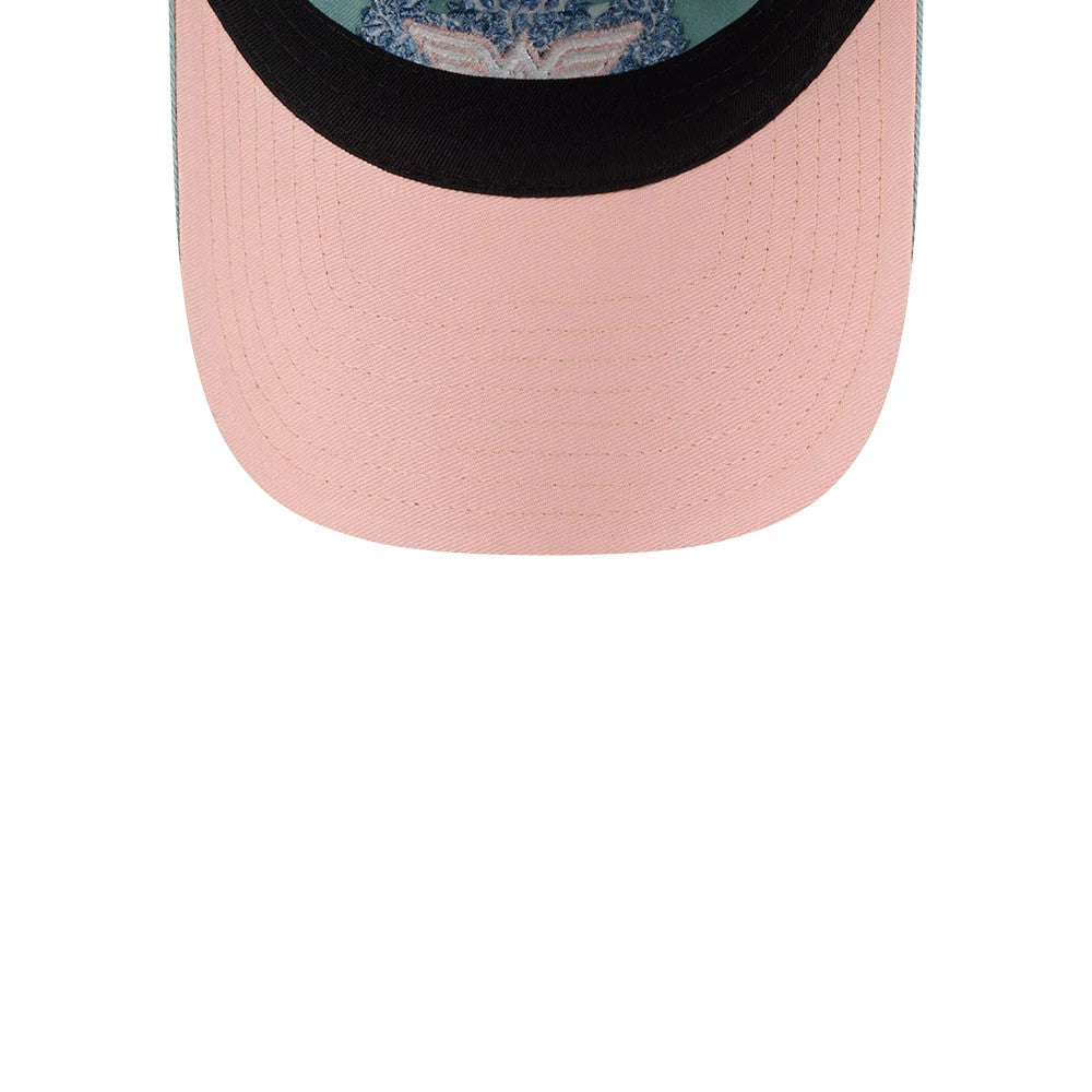 New Era Womens DC Wonder Woman Pastel Blue Casual Classic Adjustable Cap, top view showing a pastel pink curved visor with black edging and a patterned mint green crown, featuring a view of the Wonder Woman logo beneath the visor.