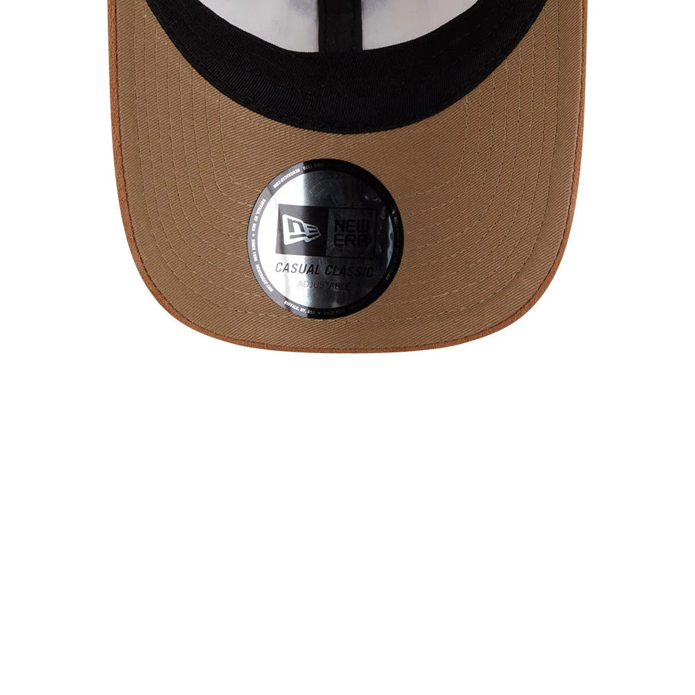 Womens DC Wonder Woman White New Era Casual Classic Adjustable Cap, underside view showing the brown visor with a silver New Era Casual Classic sticker in the centre, and a contrasting black sweatband lining.