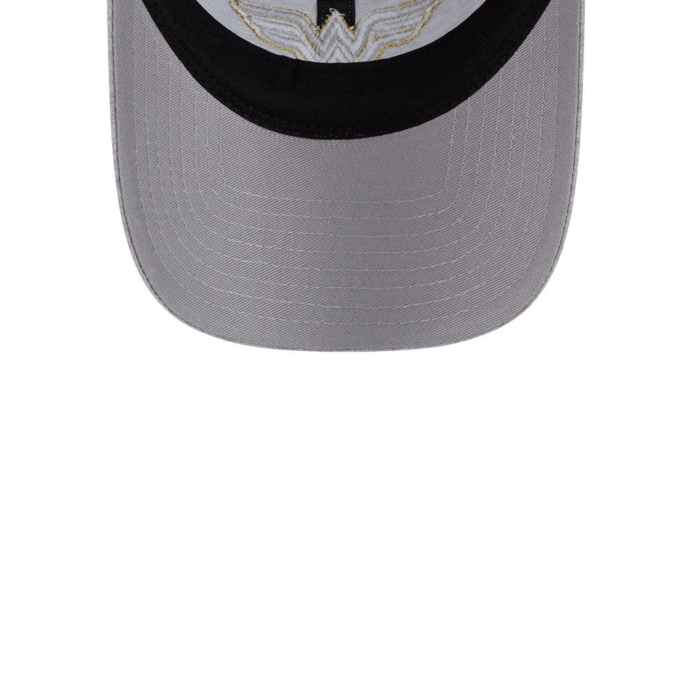 New Era Womens DC Wonder Woman Grey Open Back Cap, top view showing the intricate gold-embroidered Wonder Woman logo on the grey visor, with a contrasting black crowning detail, featuring a structured curved visor design.