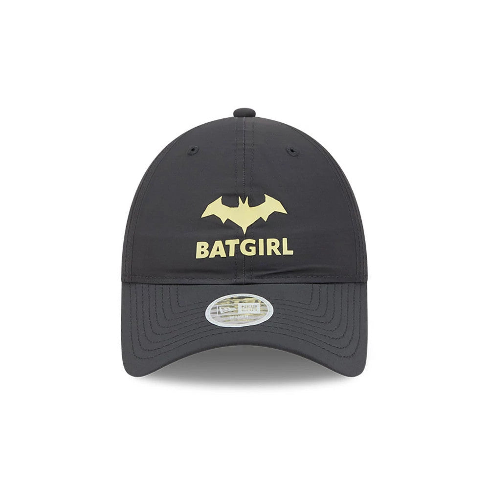 New Era Womens DC Batgirl Charcoal Open Back Cap, front view showing a yellow Batgirl logo with the bat emblem above lettering on the centre front panel, set on a dark charcoal crown with a curved visor and a transparent size sticker.