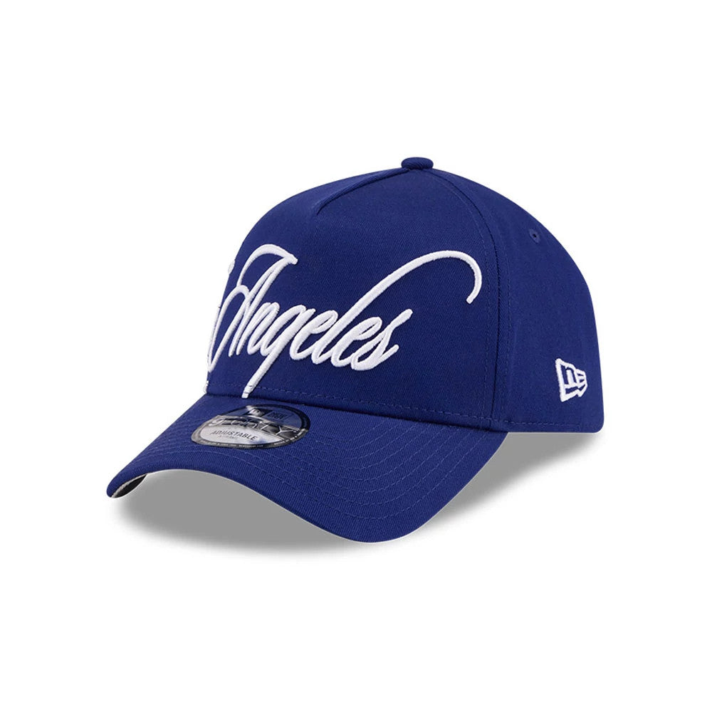 LA Dodgers MLB Calligraphy Dark Blue New Era 9FORTY A-Frame Adjustable Cap, three-quarter view showing the raised white calligraphy Los Angeles embroidery on the front panel, a matching dark blue curved visor with a 9FORTY size sticker.