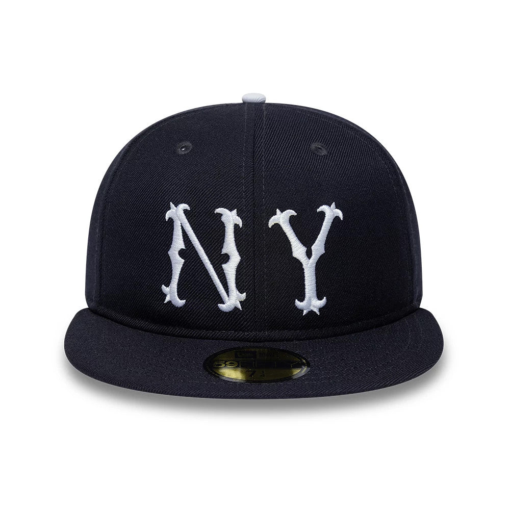 New York Highlanders MLB Cooperstown Navy New Era 59FIFTY Fitted Cap, front view showing raised white NY embroidery on the front panels, with a flat navy visor and the gold 59FIFTY size sticker on the top.