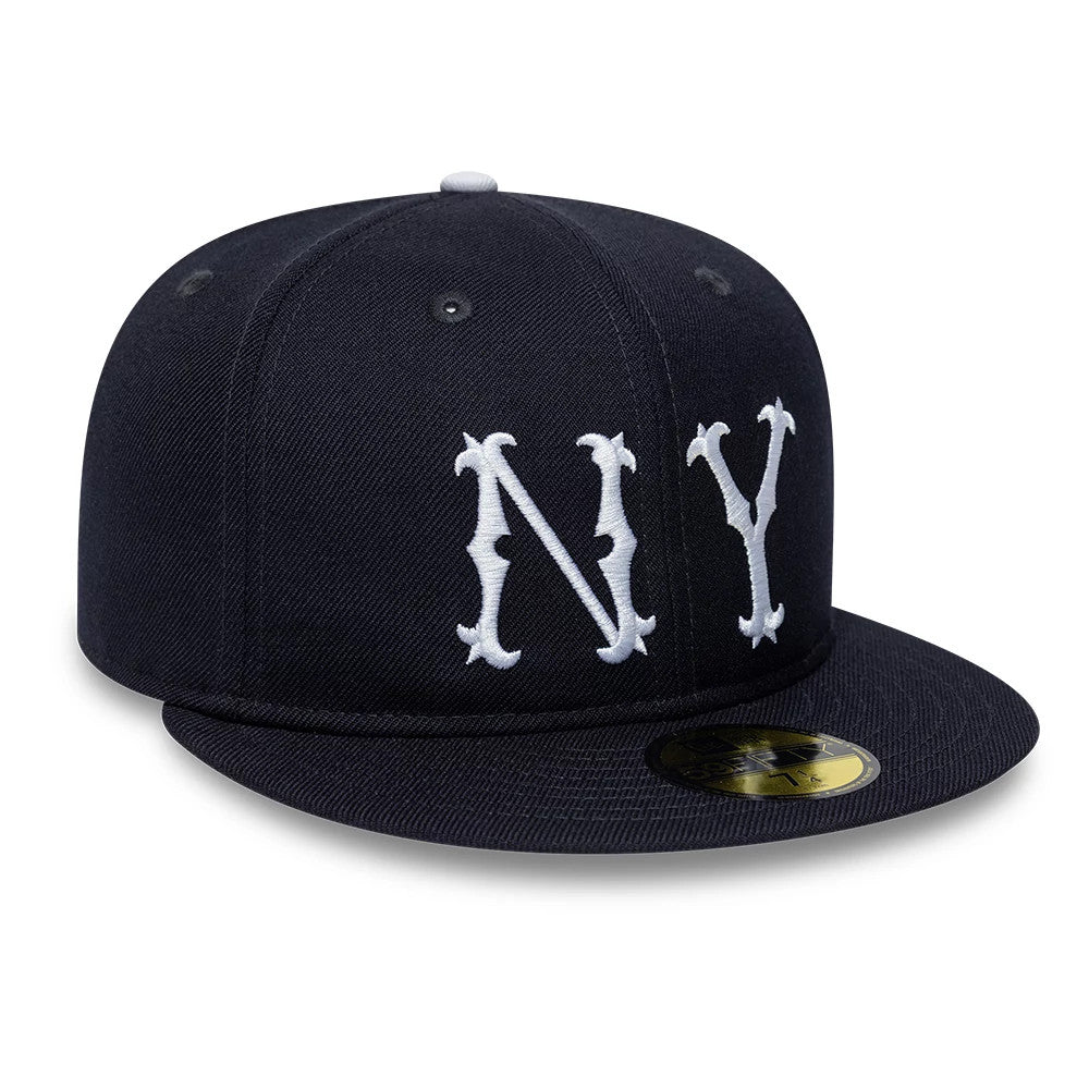 New York Highlanders MLB Cooperstown Navy New Era 59FIFTY Fitted Cap, front view showing raised white embroidered NY logo on the navy structured crown, with a flat navy visor and a gold 59FIFTY size sticker centrally placed.