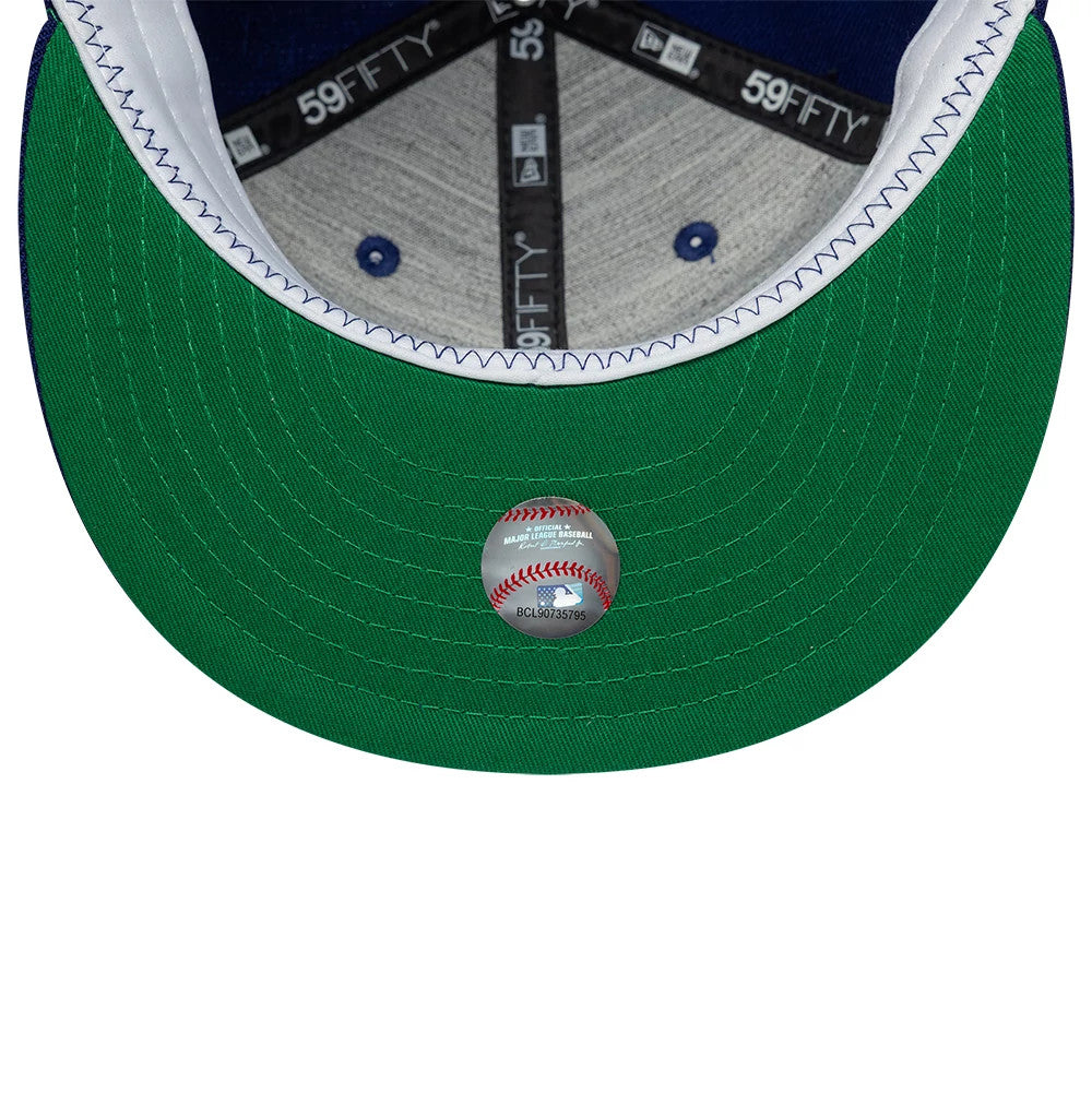Brooklyn Dodgers MLB Cooperstown Dark Blue New Era 59FIFTY Fitted Cap, inside view showing the grey sweatband, black 59FIFTY taping along the seams, and a bright green undervisor with a baseball-themed sticker attached to its centre.