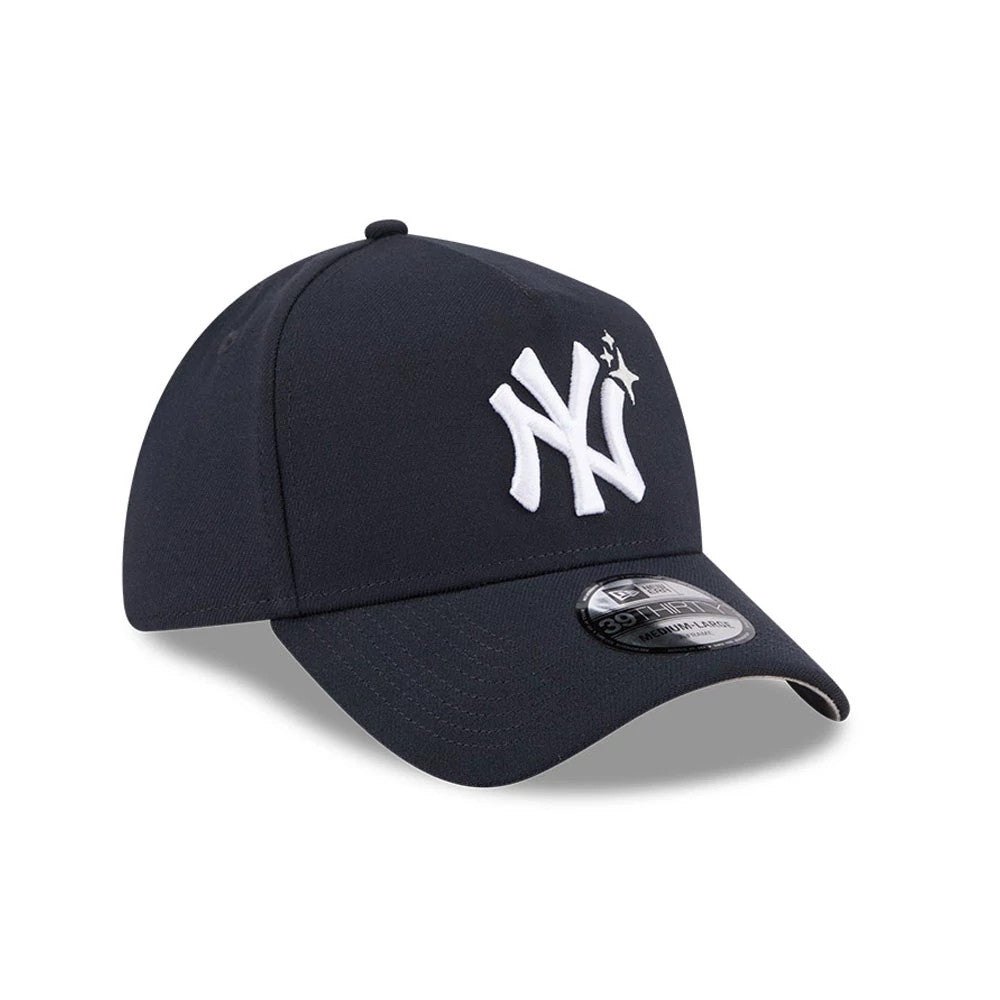 Yankees MLB Glow Stars Navy New Era 39THIRTY A-Frame Stretch Fit Cap, front view showing the white embroidered NY logo with a small star detail on the navy structured crown, a curved visor, and a 39THIRTY size sticker on the visor.
