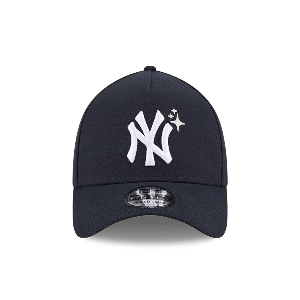 Yankees MLB Glow Stars Navy New Era 39THIRTY A-Frame Stretch Fit Cap, front view showing the white NY logo with a star detail embroidered on the structured navy front panel, and a 39THIRTY size sticker on the slightly curved visor.