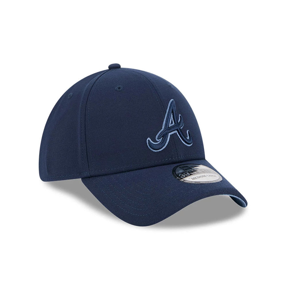 Atlanta Braves MLB Faded Oceanside Dark Blue New Era 39THIRTY Stretch Fit Cap, front view showing the light blue raised embroidered A logo on the dark blue structured crown, with a curved visor and a 39THIRTY size sticker on top.