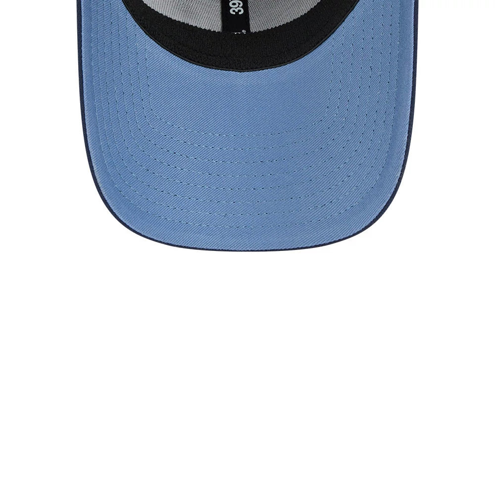 Atlanta Braves MLB Faded Oceanside Dark Blue New Era 39THIRTY Stretch Fit Cap, inside view showing the contrast of the black sweatband against the light blue undervisor, with the 39THIRTY label on the inner crown edge.