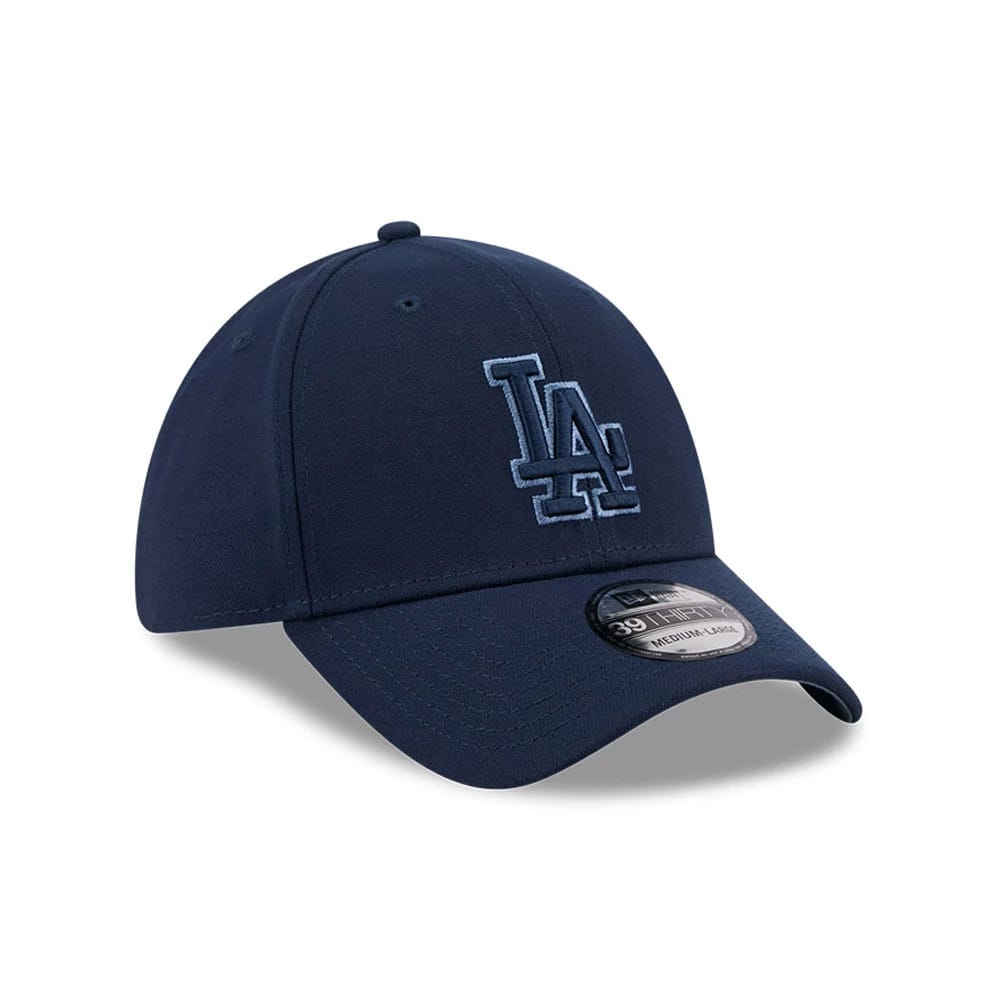 Pictured is this MLB Faded Oceanside LA Dodgers 39THIRTY Stretch Fit cap in dark blue. 4