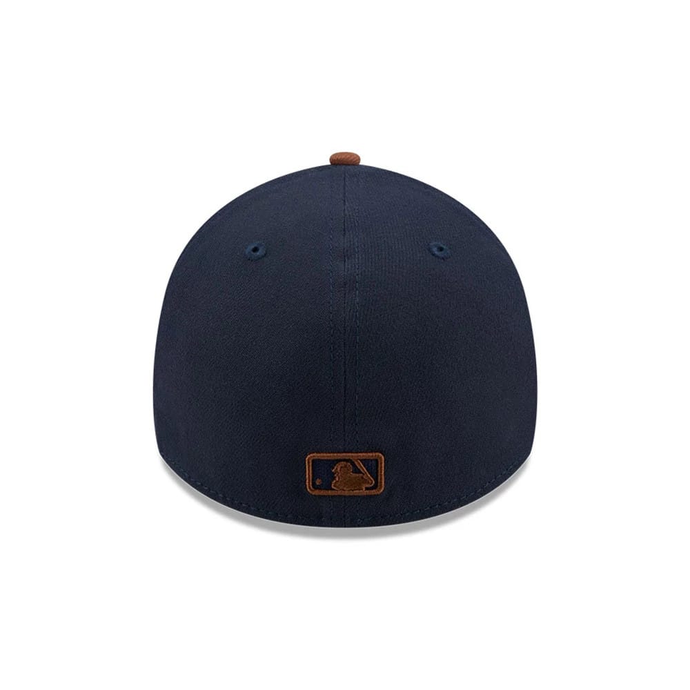 Dodgers MLB Blueberry Tiramisu Navy New Era 39THIRTY A-Frame Stretch Fit Cap, rear view showing a brown embroidered MLB Batterman logo centred on the back panels, with navy fabric and matching navy eyelets on the structured crown.